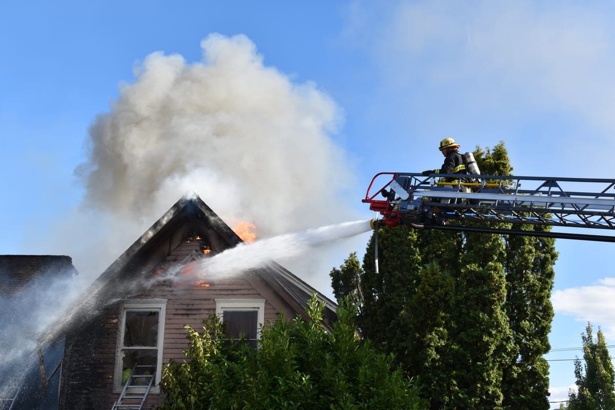 One dead, firefighter briefly hospitalized after Forest Grove apartment fire
